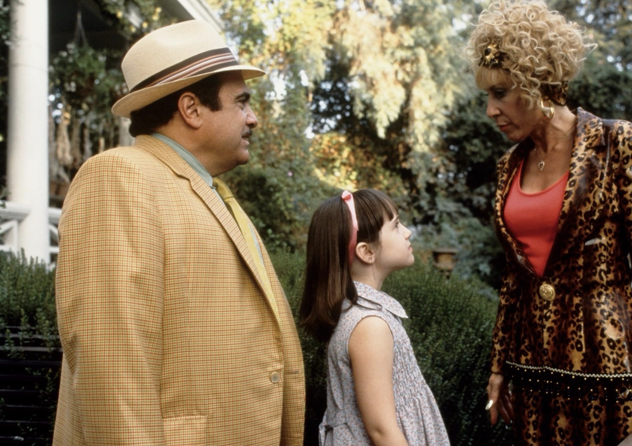 Danny DeVito, Mara Wilson, and Rhea Perlman in “Matilda” celebrities